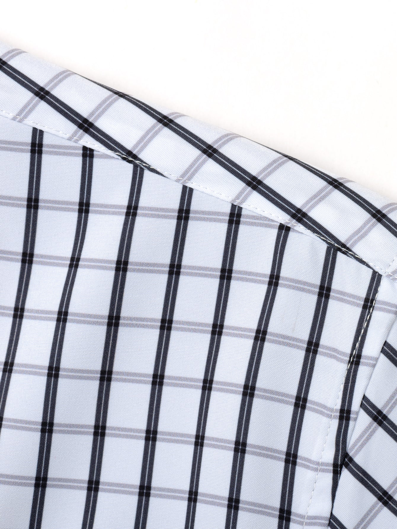 CHEMISE À MANCHES LONGUES À CARREAUX AVEC BOUTONS